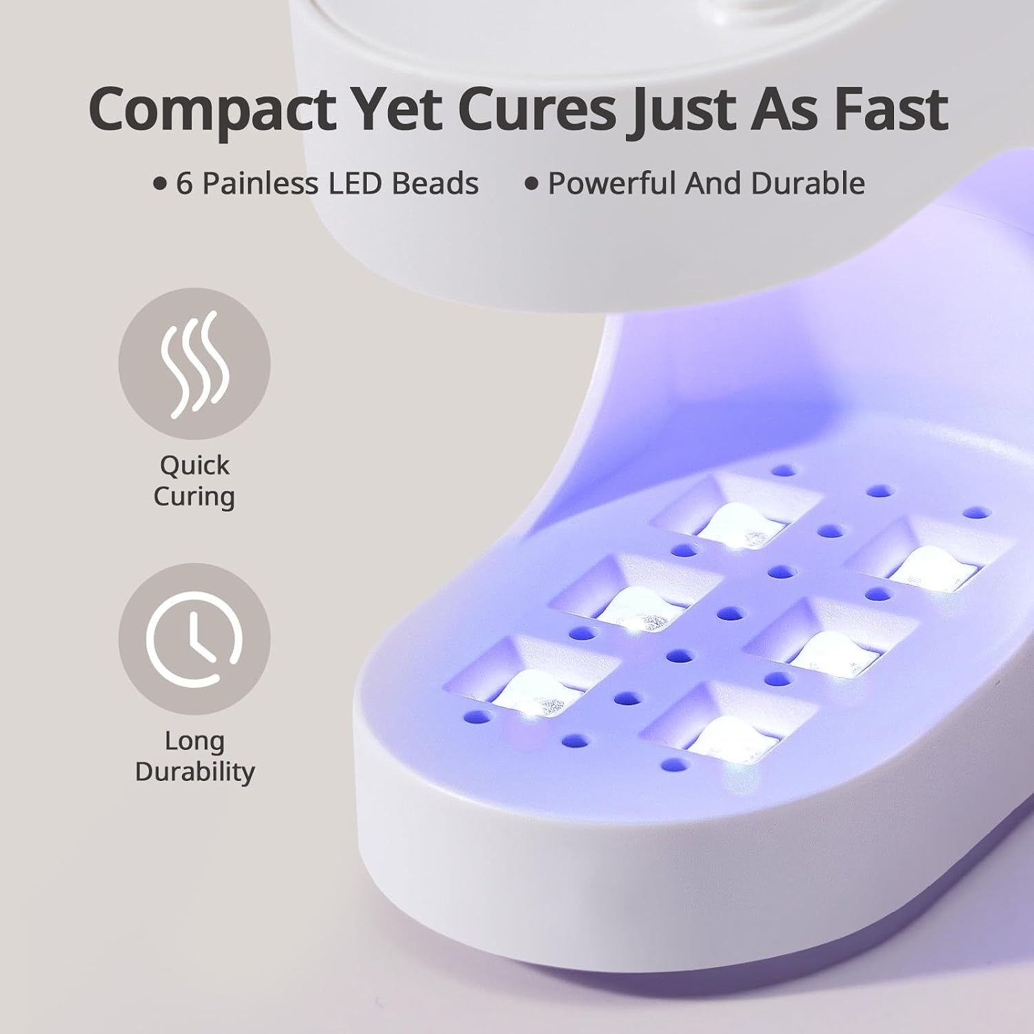 Mini UV LED nail lamp shown with USB cable for portable gel curing - 2